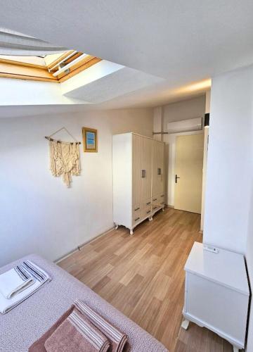 Postel nebo postele na pokoji v ubytování Duplex Apartment Close to Kite Surf Center in Urla