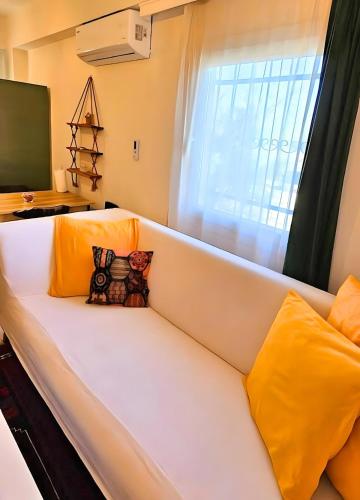 Postel nebo postele na pokoji v ubytování Duplex Apartment Close to Kite Surf Center in Urla
