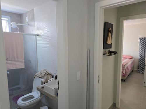 Et badeværelse på Apartamento Beira Mar 3 Suites