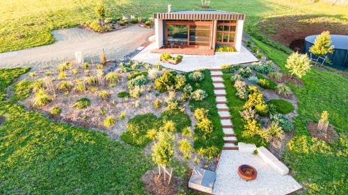 an overhead view of a house with a garden at Yonder Studio at Basalt Luxury Accommodation in Canobolas