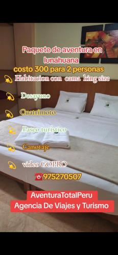 a poster of a bed in a room at Hostal Aventura Total Perú_lunahuana in Lunahuaná