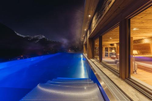 Bazén v ubytování Genusshotel Vermala Montafon nebo v jeho okolí