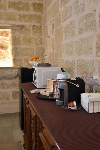 Η κουζίνα ή μικρή κουζίνα στο Suite Palazzo Palmieri