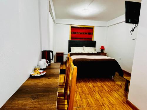 Μια τηλεόραση ή/και κέντρο ψυχαγωγίας στο B&B Mama Pilli Huaraz