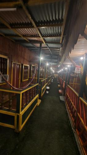 a hallway of a library with rows of books at bahia del sol - ladrilleros in Buenaventura