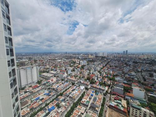 an overhead view of a large city with buildings at TC Apartment & Homestay in An Khê