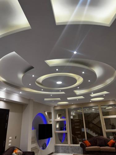 Coin salon dans l'établissement فيلا السعادة