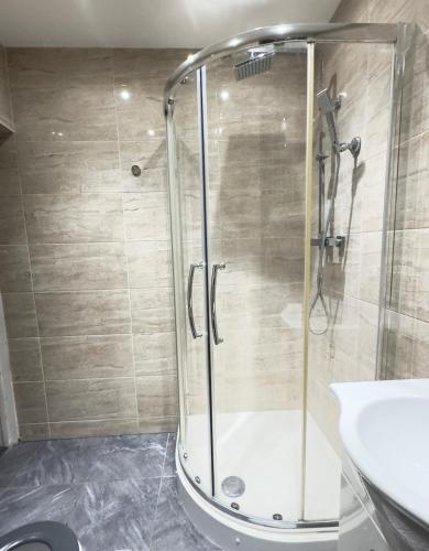 a bathroom with a shower and a sink at Apartment in Caversham in Caversham