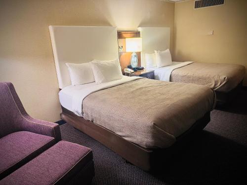 Postel nebo postele na pokoji v ubytování Quality Inn Horseheads