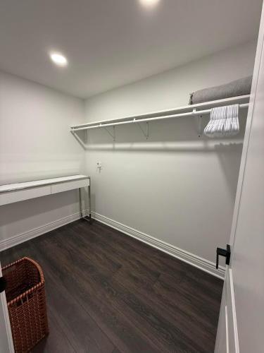 an empty room with a shelf on the wall at Beautiful modern house in Clearwater