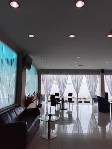 Χώρος καθιστικού στο D'merlion Hotel Batam