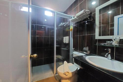 Ένα μπάνιο στο D'merlion Hotel Batam
