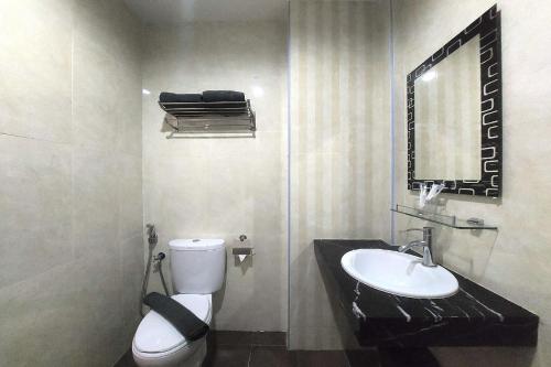 Ένα μπάνιο στο D'merlion Hotel Batam