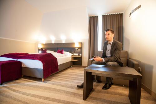 Amalienburg - Boutique & Boarding Hotelにあるベッド