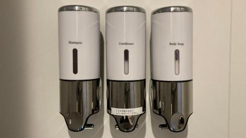 a group of three blenders sitting next to each other at Awaji Island Trailer House Rental Villa Yunetomari Akashi in Awaji