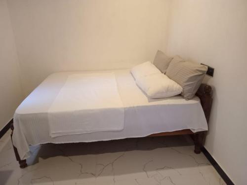 Postel nebo postele na pokoji v ubytování Razza's Home Stay