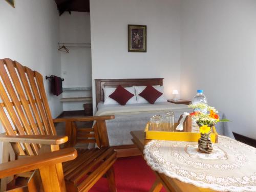 Posezení v ubytování Kadalla Cottage