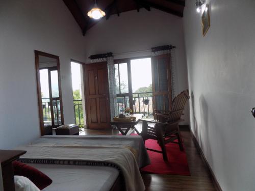 Posezení v ubytování Kadalla Cottage