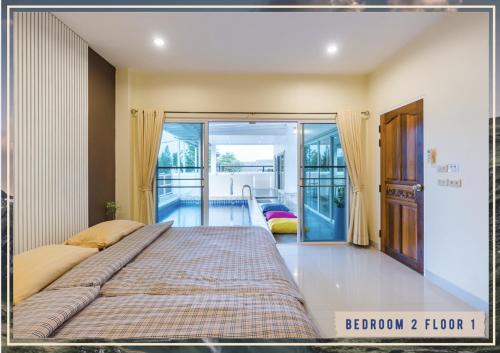 Postel nebo postele na pokoji v ubytování Fira villa Huahin