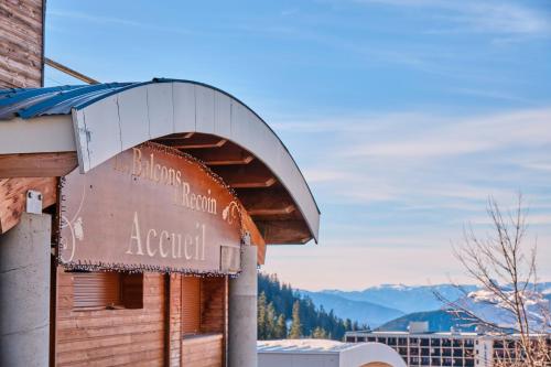 a sign on the side of a building at Les Myrtilles in Chamrousse