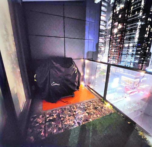a black bag sitting on the floor of a building at Luxurious Downtown condo with spectacular views in Calgary