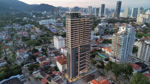 an overhead view of a city with tall buildings at Landison Hotel Penang in George Town