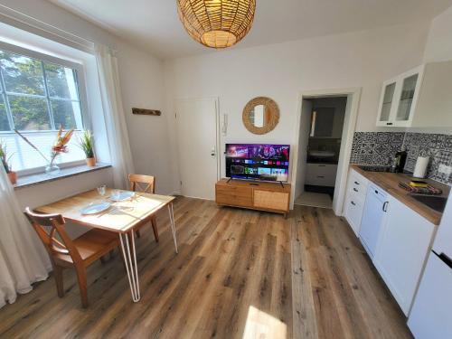 Kuchyň nebo kuchyňský kout v ubytování 2-Zimmer Wohnung 2 - Apartments am Schloss