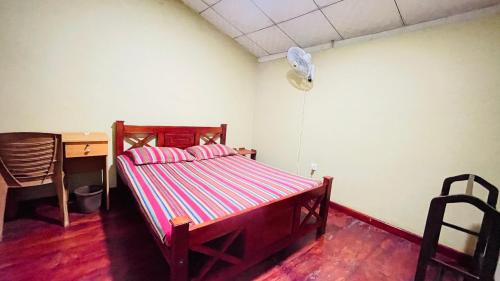 Postel nebo postele na pokoji v ubytování Wicky Home Stay