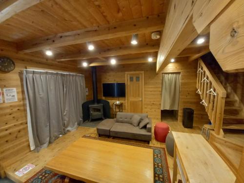 Μια τηλεόραση ή/και κέντρο ψυχαγωγίας στο Villa Orange Cabin