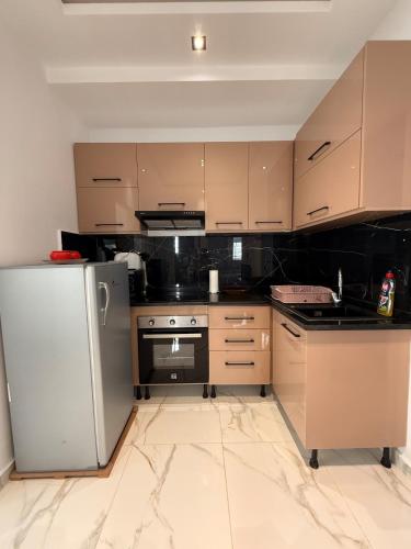 Η κουζίνα ή μικρή κουζίνα στο most charming 2 bedrooms in la Marsa