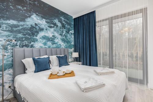 Postel nebo postele na pokoji v ubytování Rezydencja Niechorze - Nowoczesny Apartament - Parking & Taras z Ogrodem - by Noclegi Renters