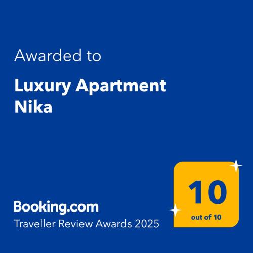 a yellow sign that reads awarded to luxury apartment nikka at Luxury Apartment Nika in Ohrid
