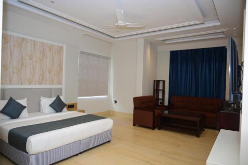 Postel nebo postele na pokoji v ubytování Hotel Prakash Continental