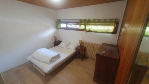 Postel nebo postele na pokoji v ubytování Logement entier, plein sud, pied des pistes, Chamrousse 1650