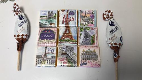a group of drawings of cities and landmarks on a wall at Hostel John Mang ゲストハウス ジョン in Tosa