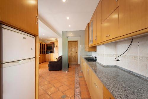 Η κουζίνα ή μικρή κουζίνα στο Xavega Apartment Torreira