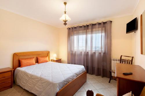 Ένα ή περισσότερα κρεβάτια σε δωμάτιο στο Xavega Apartment Torreira