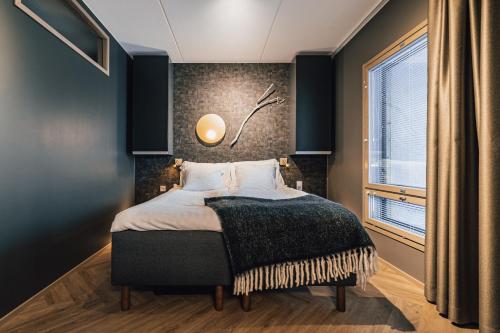 Кровать или кровати в номере Tahko Spa Hotel