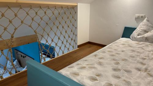 a bedroom with a bed in a room at Michlhaus nature and suites in Aldino