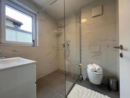 Kúpeľňa v ubytovaní Leopoldsdorf Premium Apartments
