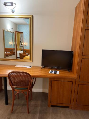 TV a/nebo společenská místnost v ubytování Hotel Motel Sporting