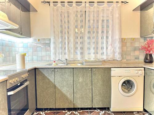 Garden Apartmentsにあるキッチンまたは簡易キッチン