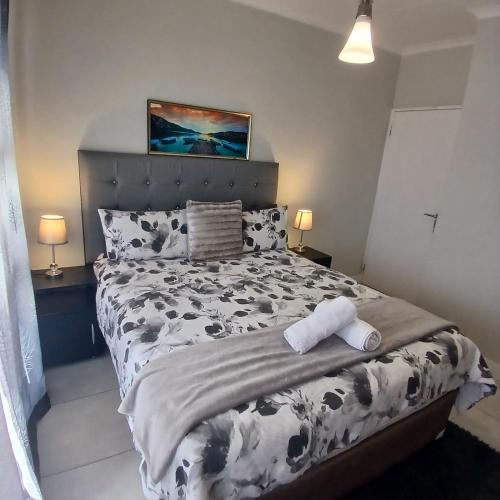 Postel nebo postele na pokoji v ubytování The Blyde 1-Bed Luxe Apartment