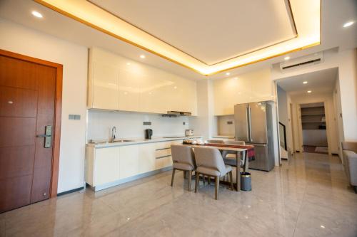 Kuchyň nebo kuchyňský kout v ubytování One Park Hotel & Residence