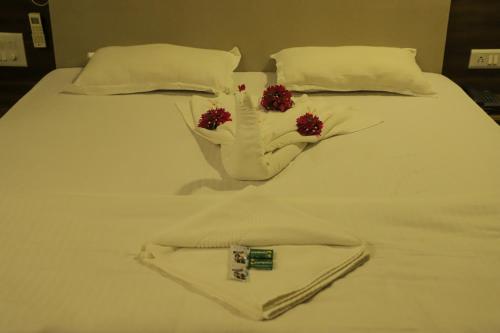 Postel nebo postele na pokoji v ubytování Encasa Resort