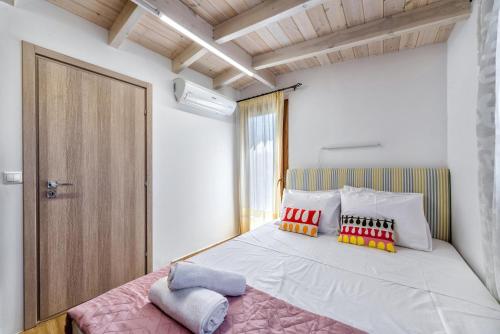 Postel nebo postele na pokoji v ubytování Guest House Aphrodite