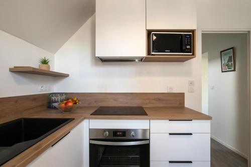 Una cocina o zona de cocina en La Canopée