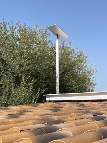 a light on the roof of a building at Casa Rocas Private Pool with swimjet! in Comares