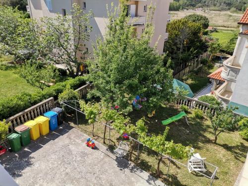 an aerial view of a backyard with a garden at Room in Lopar with Balcony, WIFI 4620-94 in Lopar