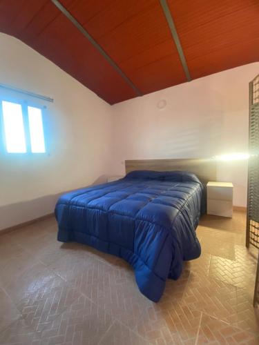 Кровать или кровати в номере Olimpya Rural Apartments